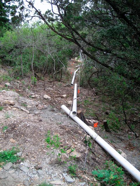 Aqueduct1.JPG - 4" PVC pipe laid out for aqueduct. April 2, 2008.