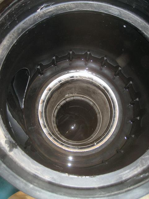 WISY4.JPG - View of WISY filter from top with cover off. Tangential inlet is at left, top of filter at center. January 19, 2010.