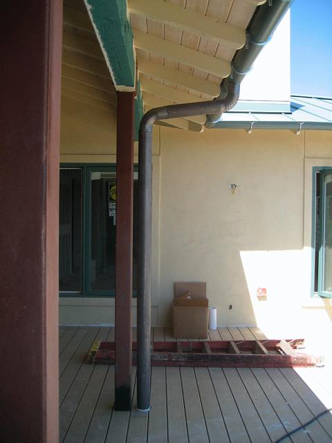 Downspout.JPG - View of 4" downspout and half-round guttering. April 11, 2008