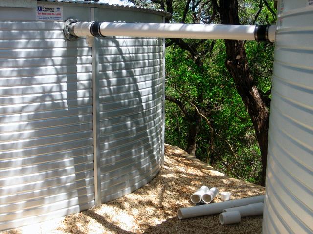 EqualizerPipe.JPG - Overflow equalizer pipe in place.This pipe serves two purposes. One is to assure that both tanks reach overflow levels at the same time in a heavy rainfall. The other is to serve as a connection for circulation filter piping. April 18, 2008.