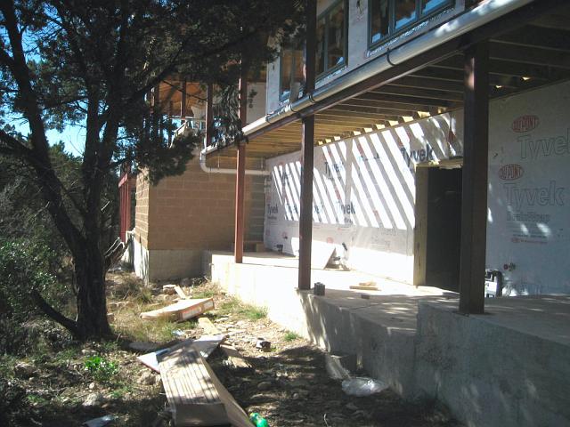 RainPipe1.JPG - View of walkway supports with attached pipes that will collect rainwater from downspouts (not yet installed). January 9, 2008.