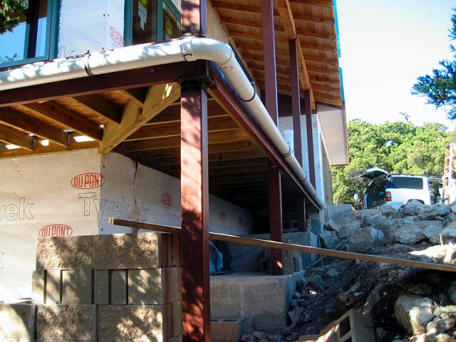 RainPipe2.JPG - Another viewiew of walkway supports with attached water collection pipes. January 9, 2008.