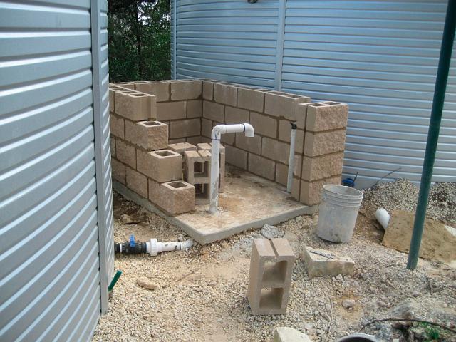PumpHouse2.JPG - Pump house under construction. Note supply outlet and valve at bottom of tank.  September 4, 2008.