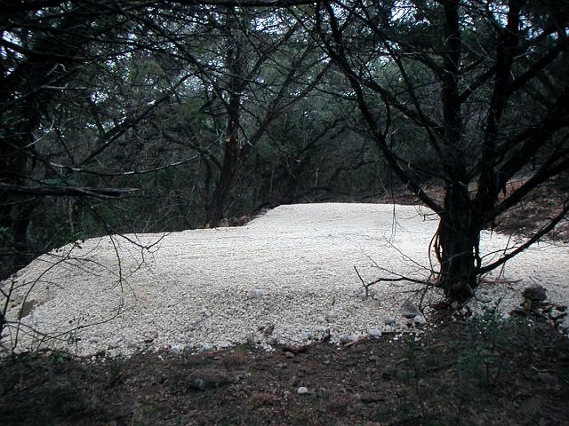 Graded3.JPG - Tank area after leveling and grading. February 23, 2007.
