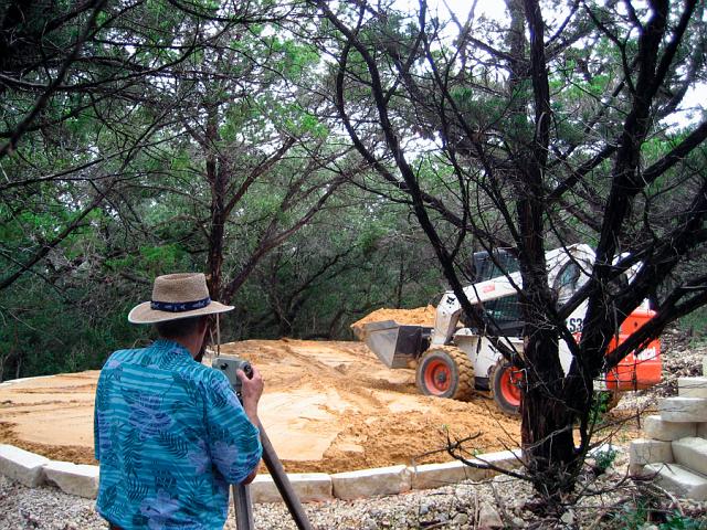 Sand.JPG - Sand  being loaded inside stone retaining ring on tank pad.  September 5, 2007.