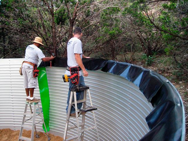 Tank6.JPG - Installation of condensation diverter at eave.  September 25, 2007.